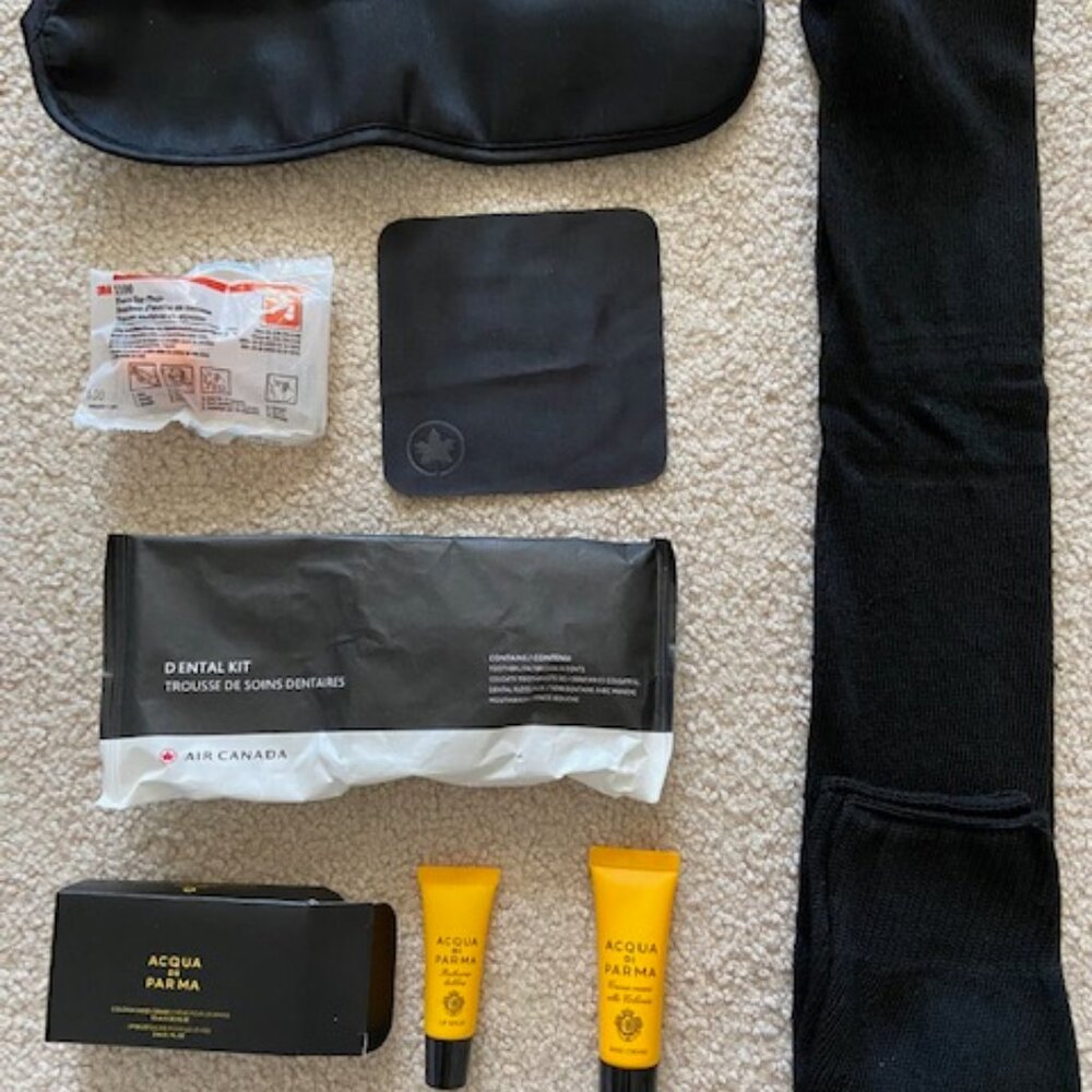 - Upper class Air Canada amenity kit eye mask dental kit socks lip balm & cream